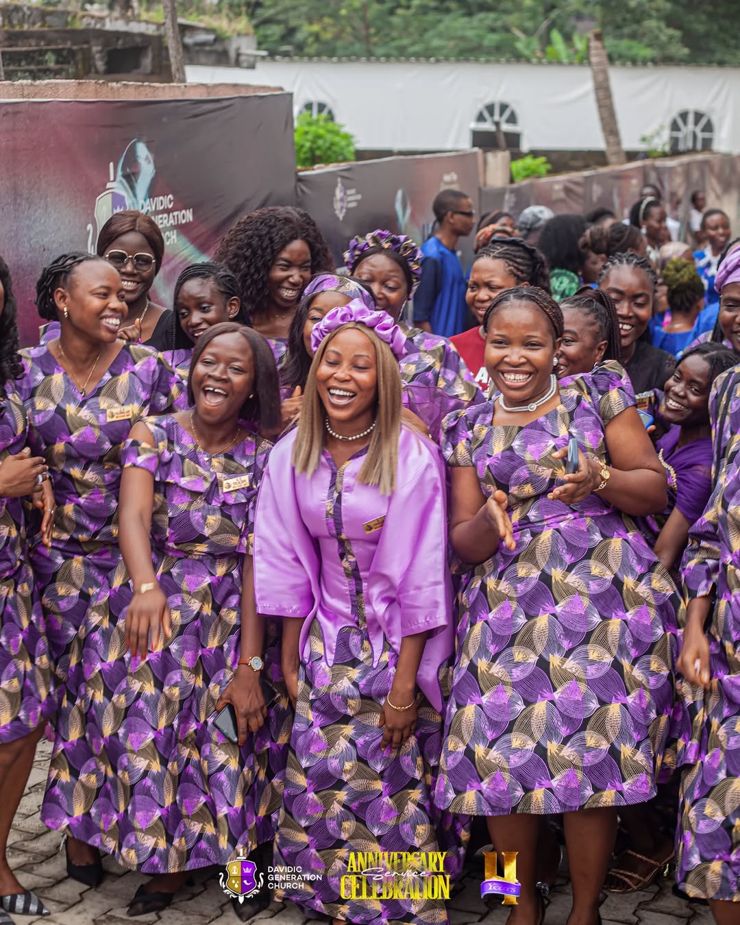 Smiling members of the DGC congregation celebrating the church’s 4th year anniversary